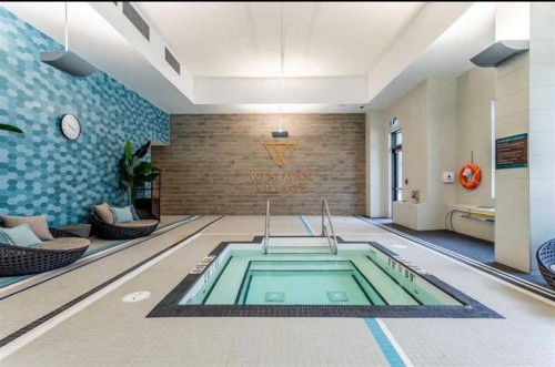 105-2231 Mahogany Boulevard Se, Calgary, AB - Indoor Photo Showing Other Room With In Ground Pool