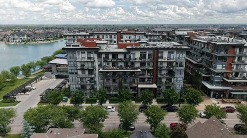 105-2231 Mahogany Boulevard Se, Calgary, AB - Outdoor With Body Of Water With View