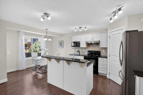 230 Evermeadow Avenue Sw, Calgary, AB - Indoor Photo Showing Kitchen