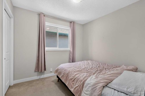 230 Evermeadow Avenue Sw, Calgary, AB - Indoor Photo Showing Bedroom
