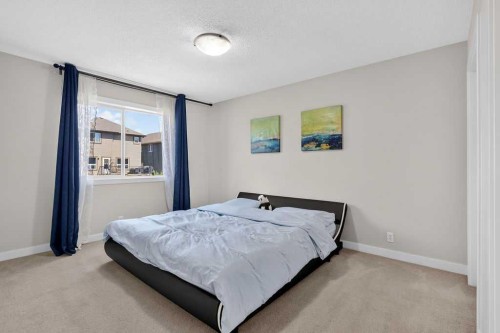 230 Evermeadow Avenue Sw, Calgary, AB - Indoor Photo Showing Bedroom