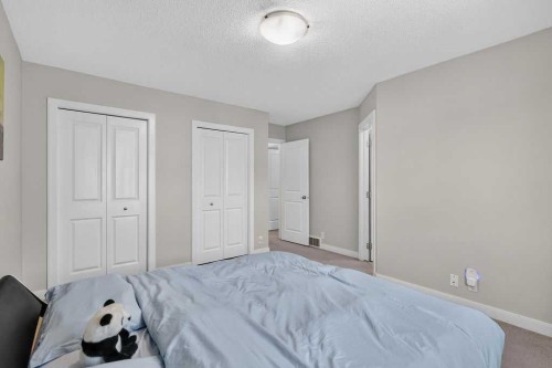 230 Evermeadow Avenue Sw, Calgary, AB - Indoor Photo Showing Bedroom