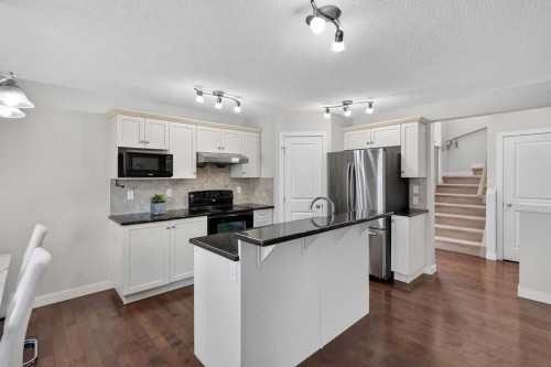 230 Evermeadow Avenue Sw, Calgary, AB - Indoor Photo Showing Kitchen