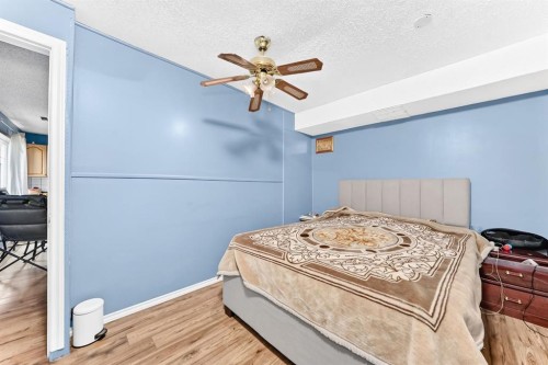 308 Taracove Estate Drive Ne, Calgary, AB - Indoor Photo Showing Bedroom