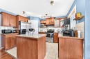 308 Taracove Estate Drive Ne, Calgary, AB  - Indoor Photo Showing Kitchen With Double Sink 