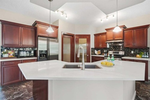 242 Tusslewood Grove Nw, Calgary, AB - Indoor Photo Showing Kitchen With Upgraded Kitchen