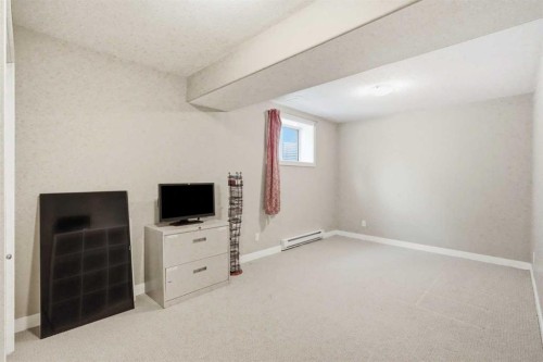 242 Tusslewood Grove Nw, Calgary, AB - Indoor Photo Showing Other Room