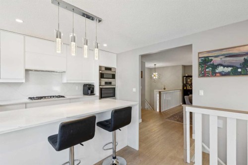 1208 Ranchlands Boulevard Nw, Calgary, AB - Indoor Photo Showing Kitchen With Upgraded Kitchen