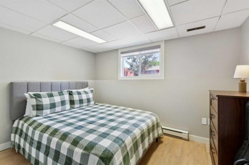1208 Ranchlands Boulevard Nw, Calgary, AB - Indoor Photo Showing Bedroom