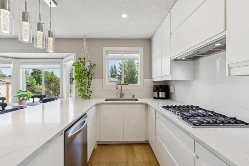 1208 Ranchlands Boulevard Nw, Calgary, AB - Indoor Photo Showing Kitchen With Upgraded Kitchen