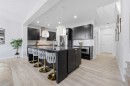 51 Setonstone Row Se, Calgary, AB  - Indoor Photo Showing Kitchen With Stainless Steel Kitchen With Upgraded Kitchen 