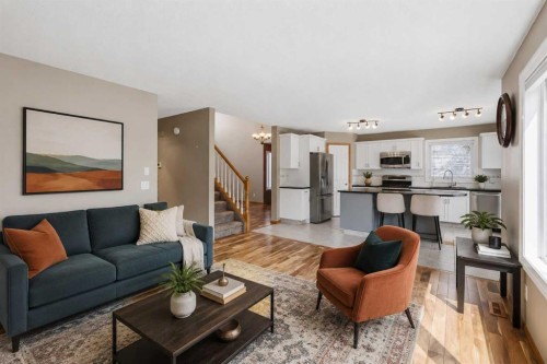 142 Riverview Circle Se, Calgary, AB - Indoor Photo Showing Living Room