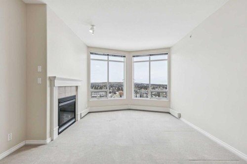 705-1726 14 Avenue Nw, Calgary, AB - Indoor With Fireplace