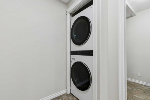 705-1726 14 Avenue Nw, Calgary, AB - Indoor Photo Showing Laundry Room