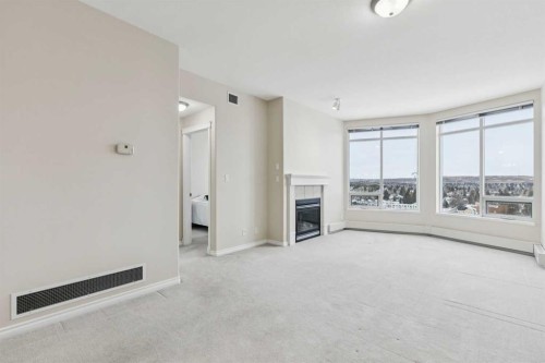 705-1726 14 Avenue Nw, Calgary, AB - Indoor With Fireplace