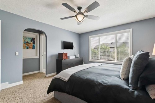 105 Bridlerange Place Sw, Calgary, AB - Indoor Photo Showing Bedroom
