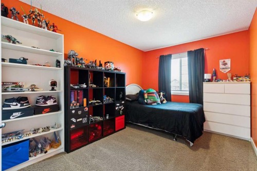 105 Bridlerange Place Sw, Calgary, AB - Indoor Photo Showing Bedroom