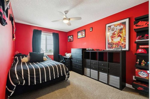 105 Bridlerange Place Sw, Calgary, AB - Indoor Photo Showing Bedroom