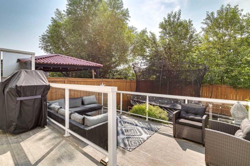 105 Bridlerange Place Sw, Calgary, AB - Outdoor With Deck Patio Veranda