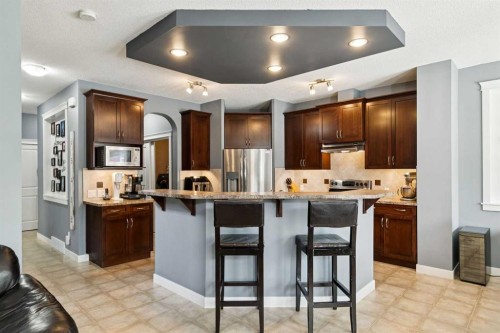105 Bridlerange Place Sw, Calgary, AB - Indoor Photo Showing Kitchen With Stainless Steel Kitchen With Upgraded Kitchen