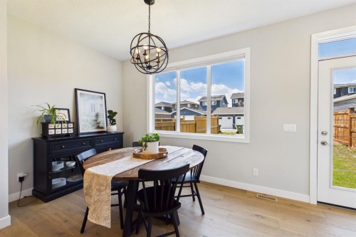 31 Sundown Manor, Cochrane, AB - Indoor Photo Showing Dining Room