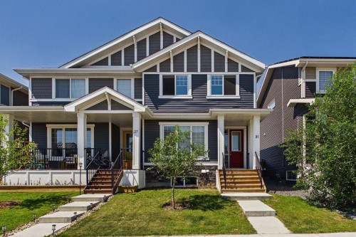 31 Sundown Manor, Cochrane, AB - Outdoor With Deck Patio Veranda With Facade