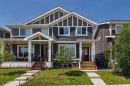 31 Sundown Manor, Cochrane, AB  - Outdoor With Deck Patio Veranda With Facade 