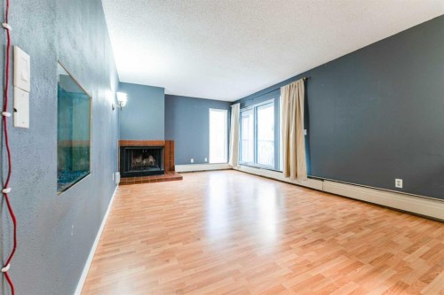 31-821 3 Avenue Sw, Calgary, AB - Indoor With Fireplace