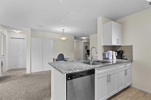 2201-81 Legacy Boulevard Se, Calgary, AB - Indoor Photo Showing Kitchen With Double Sink With Upgraded Kitchen