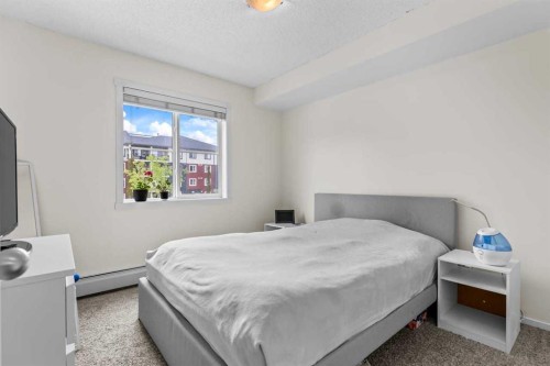 2201-81 Legacy Boulevard Se, Calgary, AB - Indoor Photo Showing Bedroom