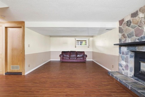 160 Marbrooke Circle Ne, Calgary, AB - Indoor With Fireplace