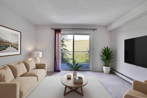 219-4000 Citadel Meadow Point Nw, Calgary, AB - Indoor Photo Showing Living Room