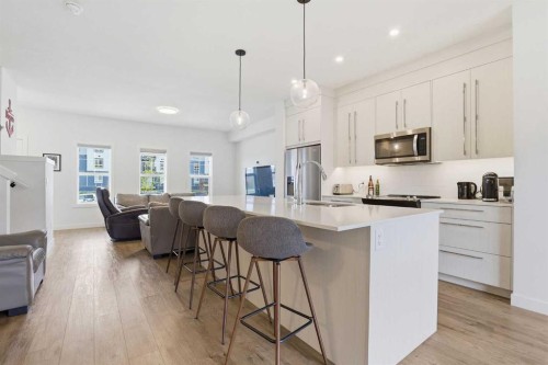154 Merganser Drive West, Chestermere, AB - Indoor Photo Showing Kitchen With Stainless Steel Kitchen With Upgraded Kitchen