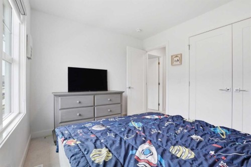 154 Merganser Drive West, Chestermere, AB - Indoor Photo Showing Bedroom