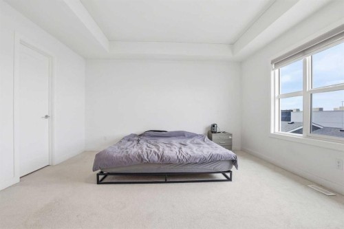 154 Merganser Drive West, Chestermere, AB - Indoor Photo Showing Bedroom
