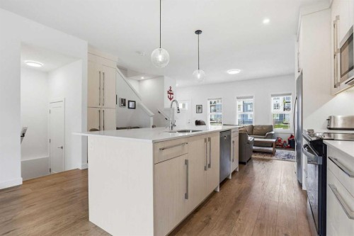 154 Merganser Drive West, Chestermere, AB - Indoor Photo Showing Kitchen With Upgraded Kitchen