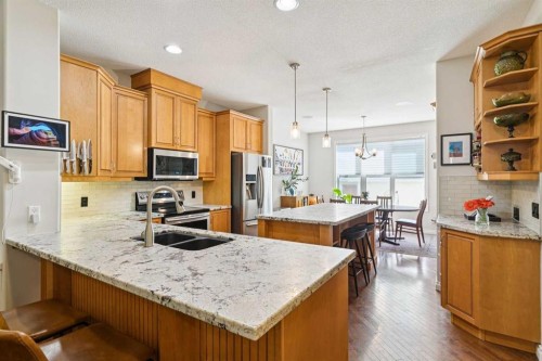 4008 Garrison Boulevard Sw, Calgary, AB - Indoor Photo Showing Kitchen With Stainless Steel Kitchen With Double Sink With Upgraded Kitchen