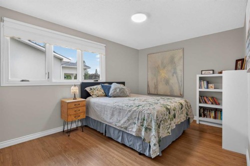 22 Varmoor Place Nw, Calgary, AB - Indoor Photo Showing Bedroom