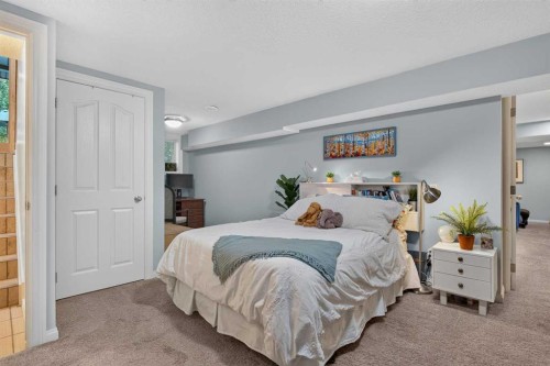 22 Varmoor Place Nw, Calgary, AB - Indoor Photo Showing Bedroom