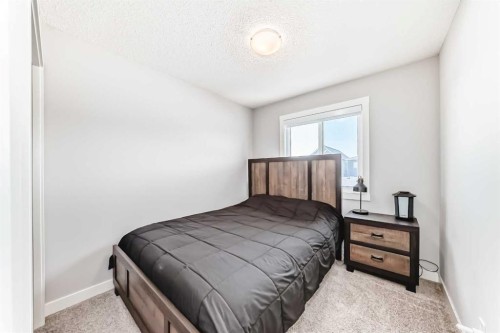 20893 Main Street Se, Calgary, AB - Indoor Photo Showing Bedroom