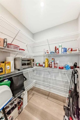 20893 Main Street Se, Calgary, AB - Indoor With Storage