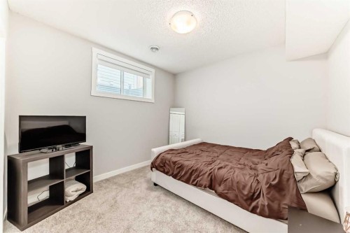 20893 Main Street Se, Calgary, AB - Indoor Photo Showing Bedroom