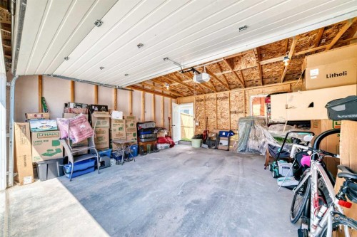 20893 Main Street Se, Calgary, AB - Indoor Photo Showing Garage