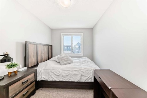 20893 Main Street Se, Calgary, AB - Indoor Photo Showing Bedroom