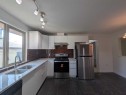 311 72 Avenue Ne, Calgary, AB  - Indoor Photo Showing Kitchen With Stainless Steel Kitchen With Double Sink With Upgraded Kitchen 