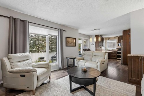 244 Scurfield Place Nw, Calgary, AB - Indoor Photo Showing Living Room