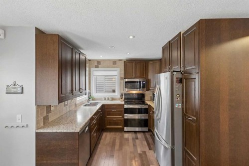 244 Scurfield Place Nw, Calgary, AB - Indoor Photo Showing Kitchen