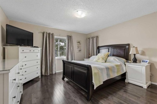 244 Scurfield Place Nw, Calgary, AB - Indoor Photo Showing Bedroom