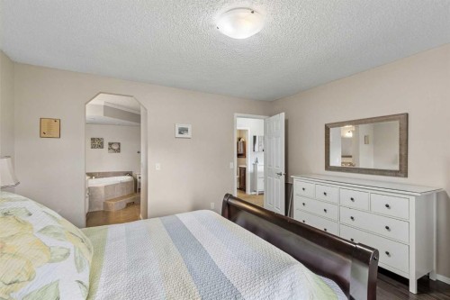 244 Scurfield Place Nw, Calgary, AB - Indoor Photo Showing Bedroom