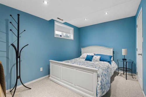 244 Scurfield Place Nw, Calgary, AB - Indoor Photo Showing Bedroom